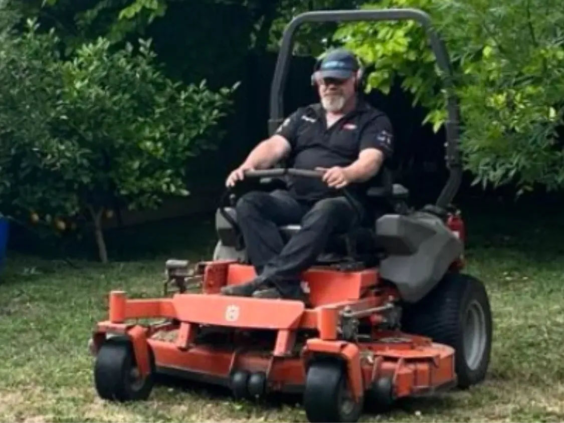 Tony at work on a ride-on mower